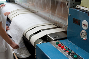 Flatwork ironer light curtain